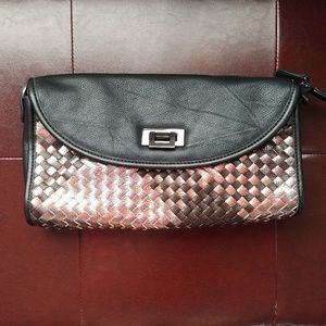 Urban Outfitters mixed woven clutch